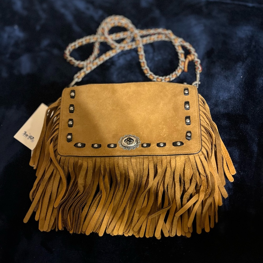 Coach limited edition suede fringe purse.